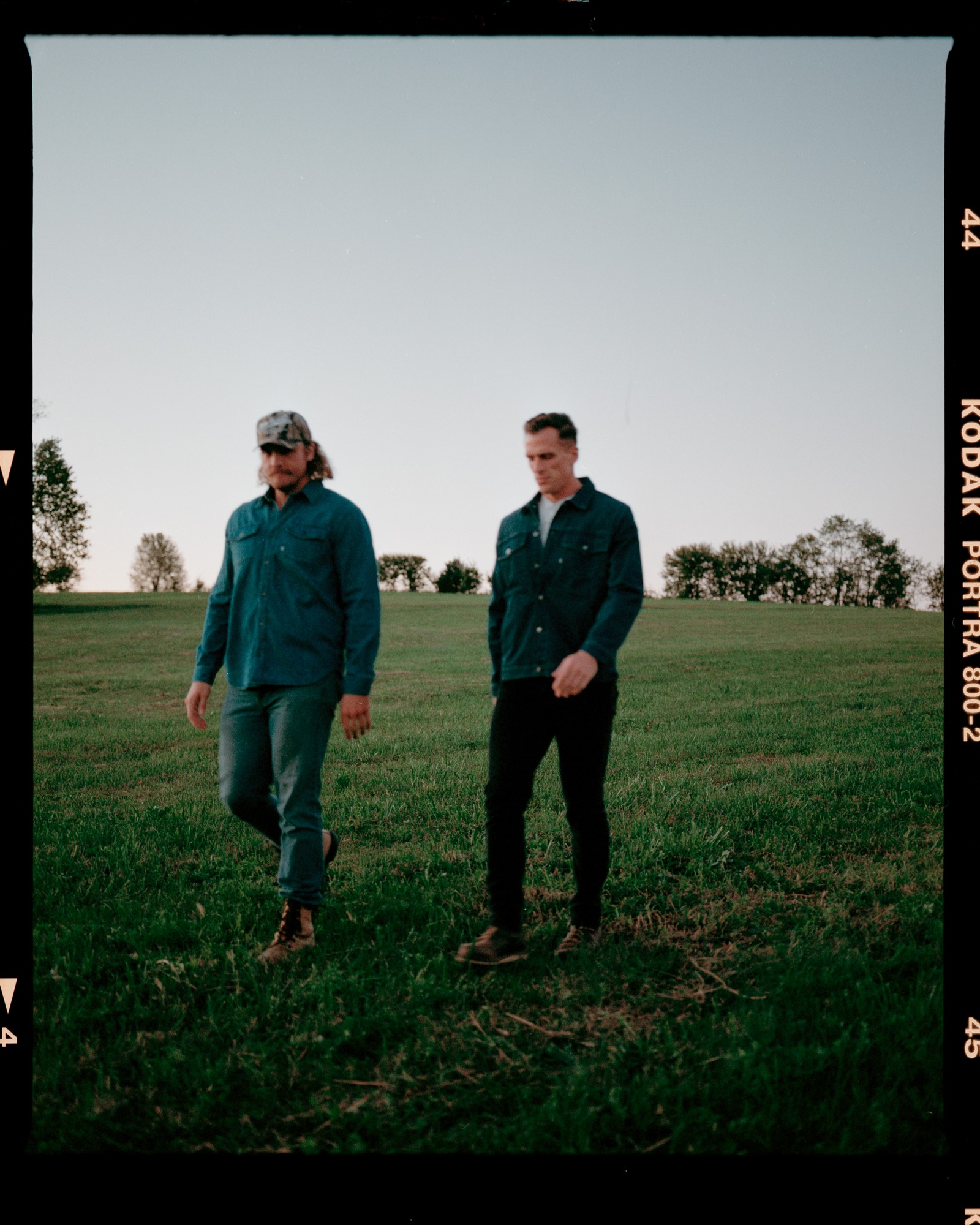 Hosts walking through Kentucky field